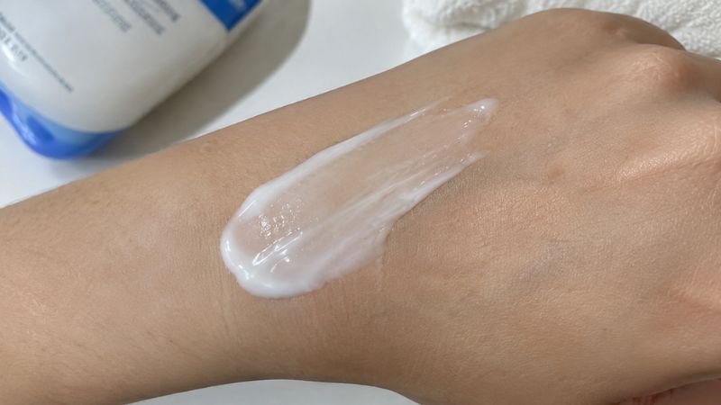 Lightweight lotion texture spreading easily across the skin